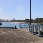 Ōhiwa Harbour, with crazy sundogs from stitching a panorama - gotta get a decent hood to stop those dogs.
